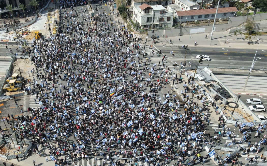 An aerial view shows protesters gathering during a demonstration against the Israeli government's controversial justice reform bill, in Tel Aviv on 1 March, 2023.