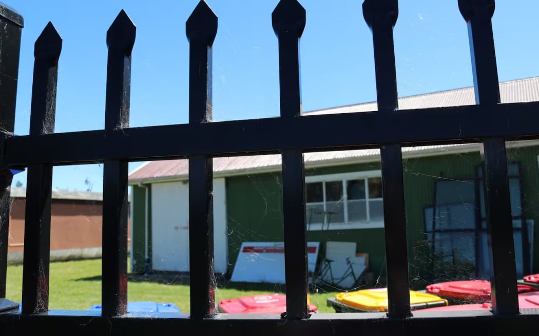 In a desperate bid to flee his attacker, the victim drove his car through a large fence and into a building at Nelson's Founders Heritage Park.