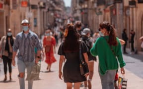 Tourists and locals mingle on the streets of Bordeaux, France. (File photo)