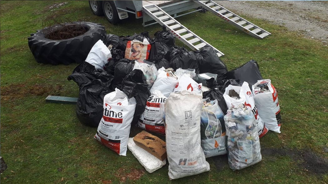 Bags filled with litter after volunteers helped with a cleanup today.