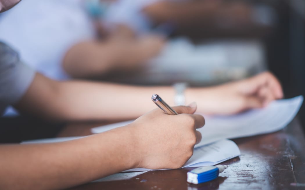 student doing exam