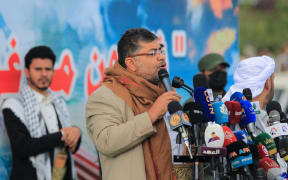 Head of Yemen's Huthi Supreme Revolutionary Committee Mohammed Ali al-Huthi addresses a demonstration in Sanaa on March 17, 2025. Huge crowds joined protests in rebel-controlled Yemen on March 17 after deadly US strikes killed dozens and sparked fears of a new cycle of violence in the conflict-torn country. (Photo by Mohammed HUWAIS / AFP)
