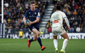 Leinster's New Zealand full-back Jordie Barrett runs with the ball during the European Champions Cup rugby union match between Stade Rochelais (La Rochelle) and Leinster at the Marcel Deflandre Stadium in La Rochelle, south-western France, on January 12, 2025. (Photo by ROMAIN PERROCHEAU / AFP)