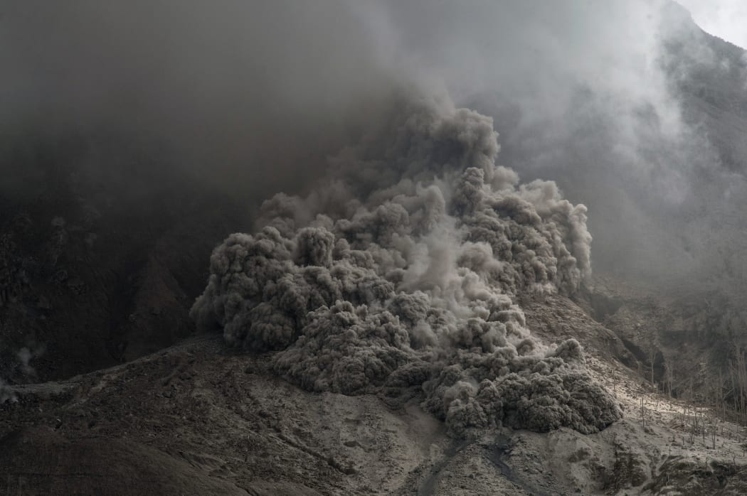 Volcanic ash spews from the mountain on 14 June 2015.