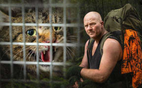 A composite image of a feral cat on the left, inside a live capture cage, caught in Fiordland National Park. On the right is hunter Victor Tindale who caught the cat and other pests on a trip to the national park.