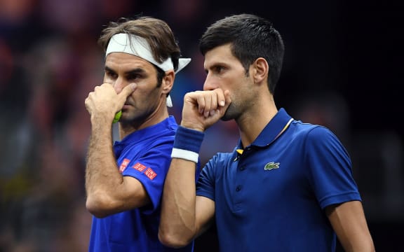 Team Europe Novak Djokovic of Serbia talks with Team Europe Roger Federer of Switzerland. 2018 Laver Cup.