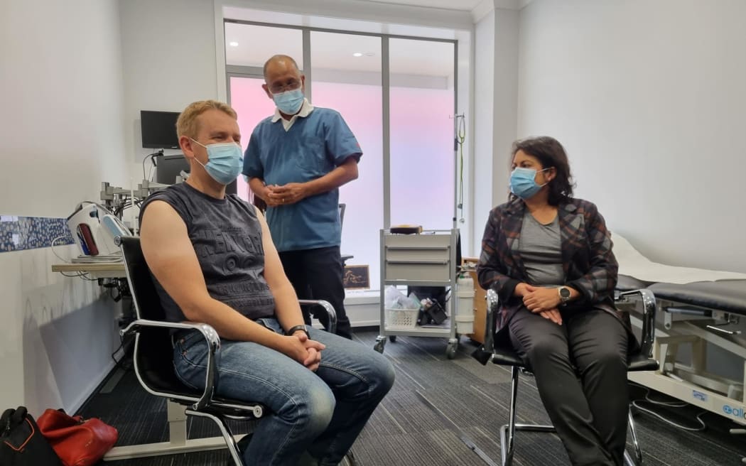 Prime Minister Chris Hipkins and Health Minister Ayesha Verrall with Dr Andrew Narayan (centre) who gave them their vaccinations at Queen Street Medical Centre in Upper Hutt.