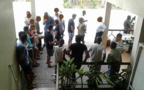 Manus refugees stage a protest outside motel of where they have been kept.