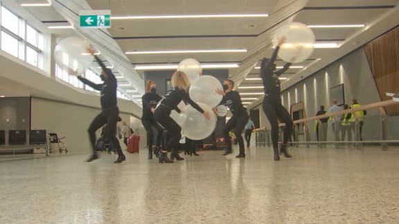 An interpretative dance welcoming trans-Tasman travellers at Melbourne Airport