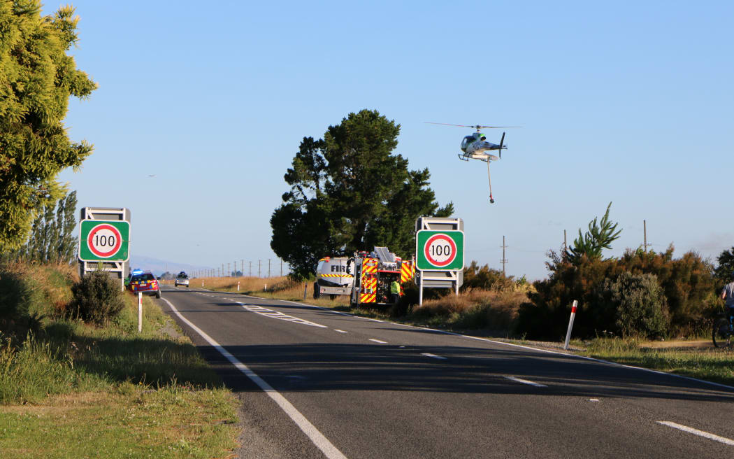 Fire volunteers containing one of multiple fires at Kirwee, west of Christchurch.