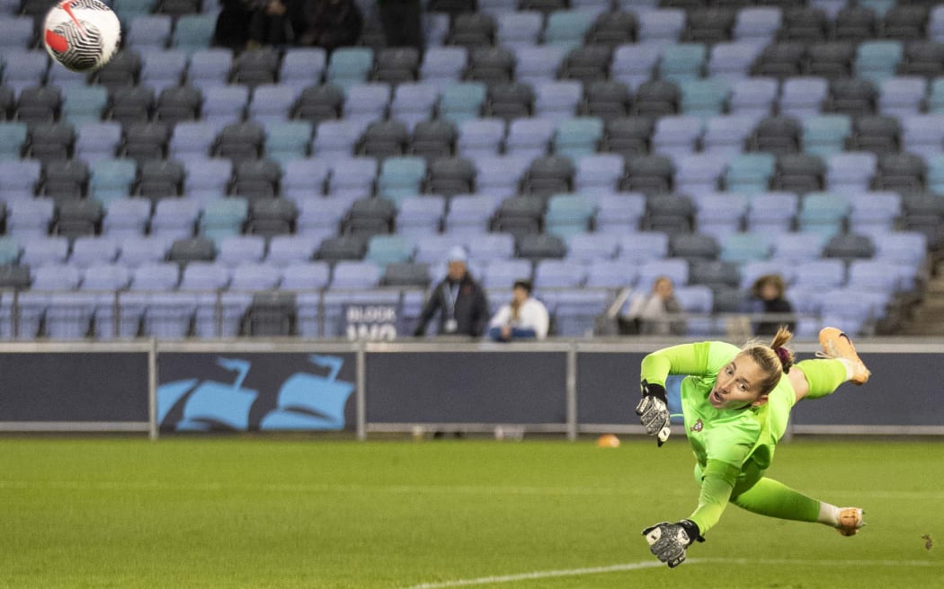 Carolina Vilao makes a save for Portugal during an international friendly against England under-23 women.