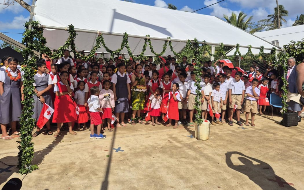 Prime Minister Christopher Luxon at G.M.S. Tokomololo school in Tonga after the Pacific Islands Forum. The New Zealand government has paid for dual language books to be printed.