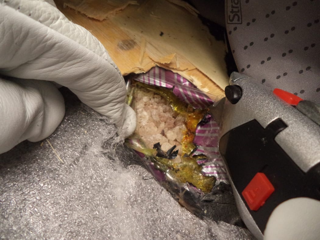Three people have been arrested for trying to smuggle up to $5m of MDMA through Auckland Airport.