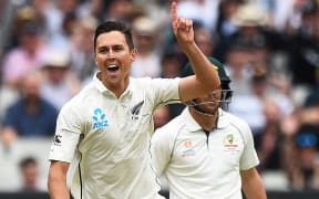Trent Boult celebrates the wicket of Joe Burns during the 2nd ICC World Test Championship match New Zealand Black Caps v Australia. Melbourne Cricket Ground, Melbourne, Australia. Thursday 26 December 2019. ©Copyright Photo: Chris Symes / www.photosport.nz