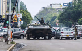 An armoured personnel carrier in Harare on Wednesday.