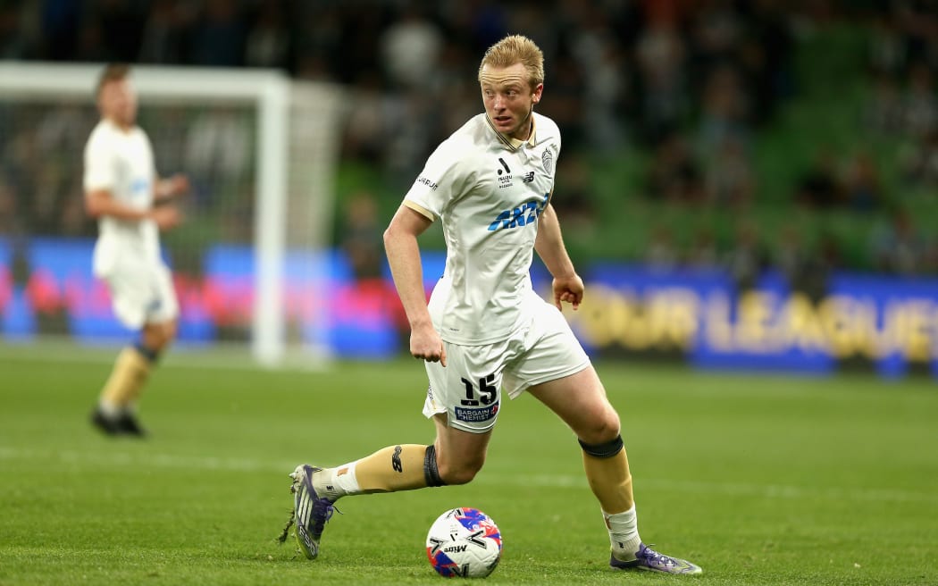 Francis de Vries of Auckland FC controls the ball during the A-League MenÕs Round 1 match between the Melbourne Victory and Auckland FC at AAMI Park in Melbourne.