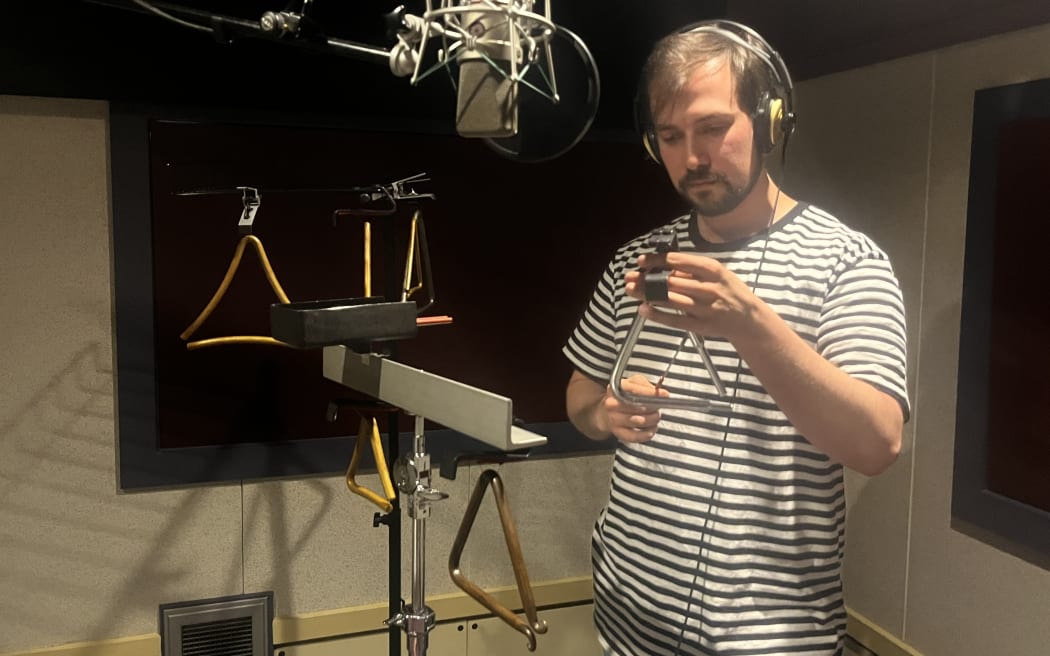 NZSO percussionist Sam Rich in the studio at RNZ in Wellington