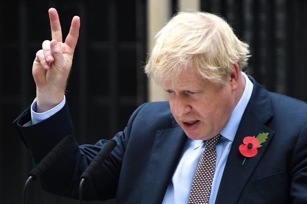 British Prime Minister Boris Johnson gestures as he addresses the nation at 10 Downing Street on November 6, 2019 in London, England.