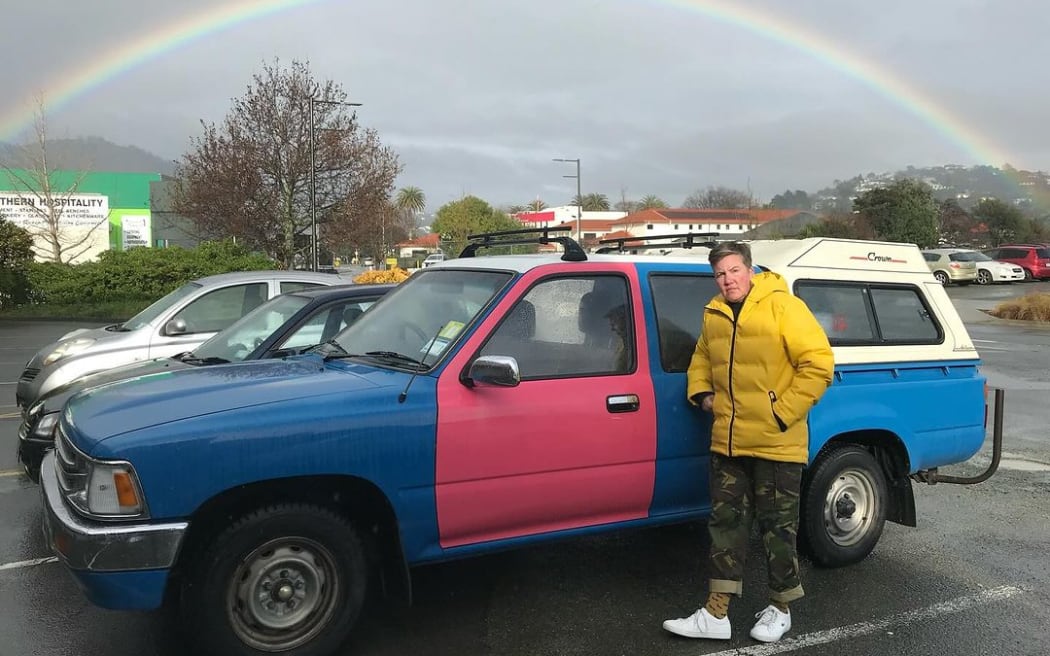 With a blue exterior and a bright pink door, Karen O'Leary's ute is unmissable.