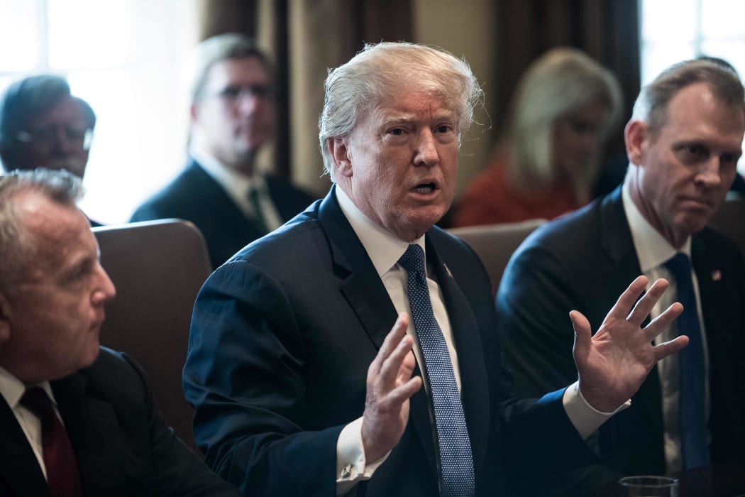President Donald Trump said "major decisions" would be made on a Syria response in the next day or two, after warning that Damascus would have a "big price to pay" over an alleged chemical attack on a rebel-held town.