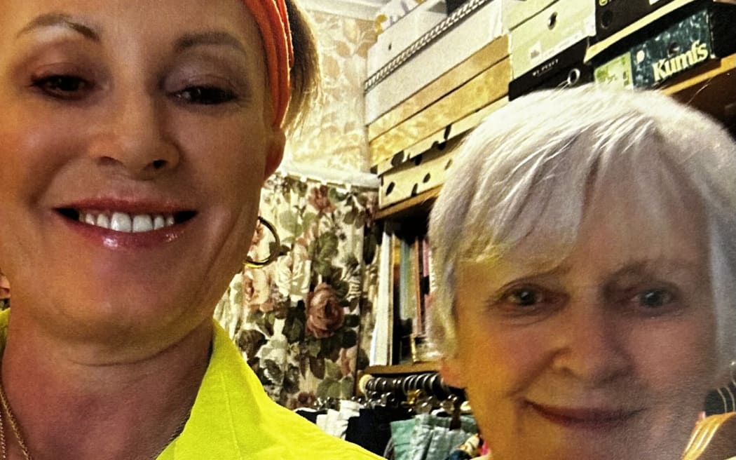 Julia DeLuney and Helen Gregory, pictured in Gregory's walk-in wardrobe. This is the photo DeLuney sent to her husband Antonio on the evening she visited her mother to buy ballet tickets - the night of Gregory's death - telling him they were trying on clothes. The photo was retrieved by police from DeLuney's phone.