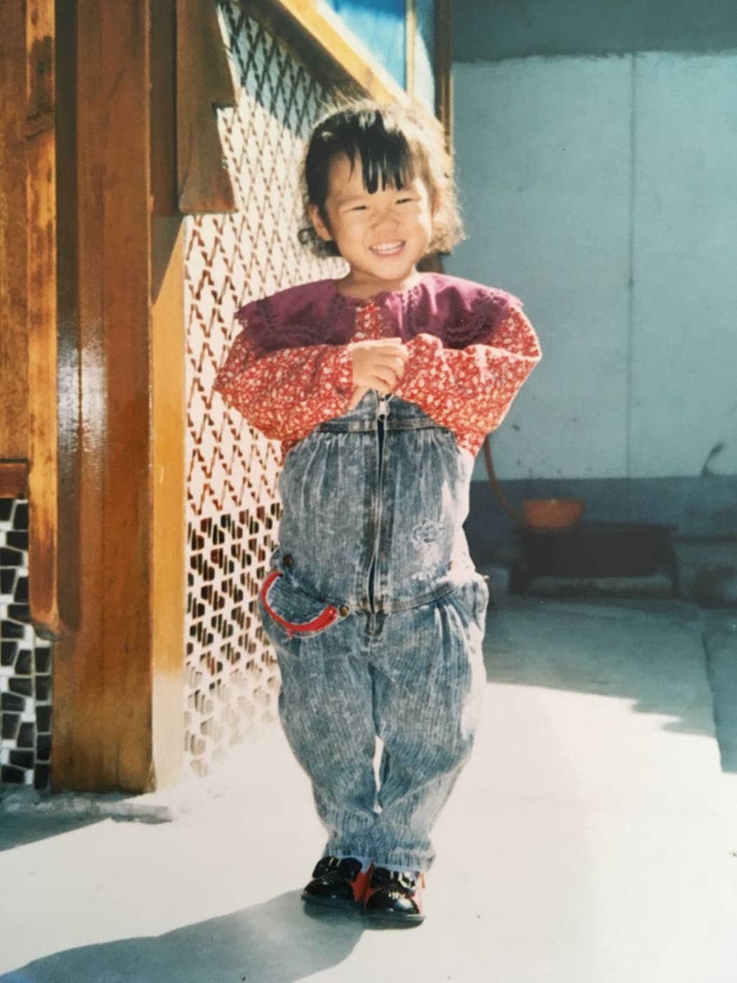 Maria, 4, wears acid wash denim.