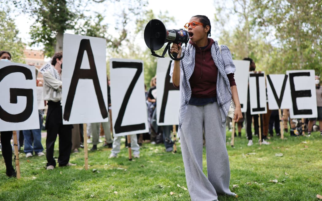 Protesters rally at an encampment in support of Gaza at the University of Southern California on 24 April, 2024 in Los Angeles, California.