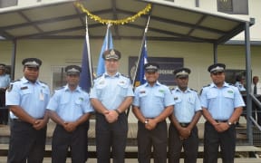 Solomon Islands police officers selected for deployment to the UN peace keeping mission in Darfur, with the RAMSI Participating Police Force Commander, John Tanti (3rd from left).