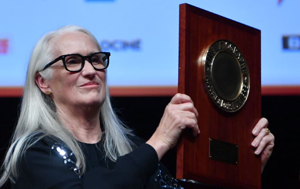 New Zealand director Jane Campion holds the 'Prix Lumiere' during the award ceremony of the 13rd edition of the Lumiere cinema Festival in Lyon, central-eastern France, on October 15, 2021.