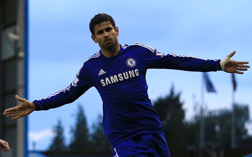 Diego Costa of Chelsea celebrates after scoring their 1st goal against Burnley, 2014.