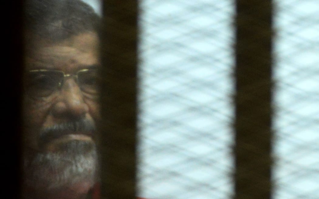 Egypt's ousted president Mohamed Morsi during his trial on espionage charges in Cairo on June 18, 2016.