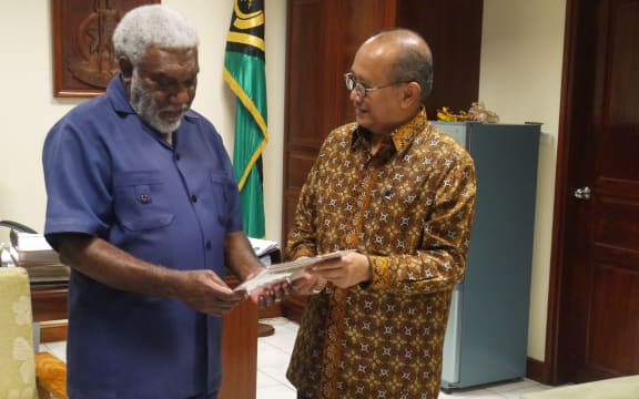 Vanuatu's Prime Minister Joe Natuman and Indonesian Ambassador Nadjib Riphat Kesoema.
