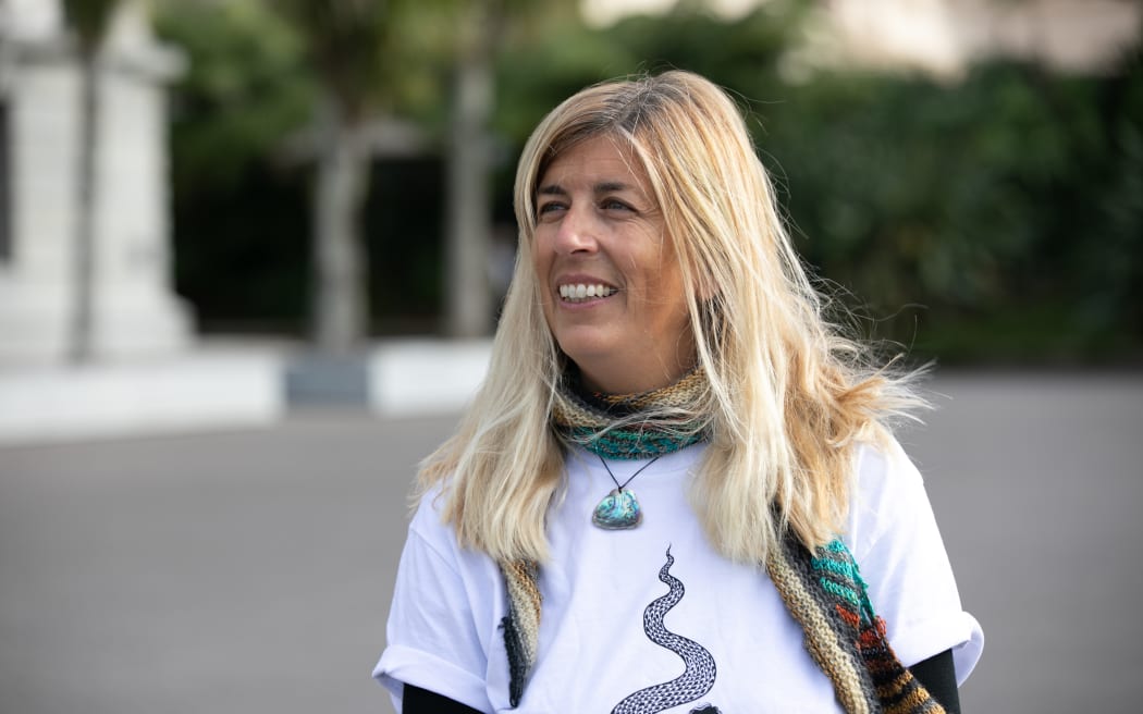 Valerie Morse, a community organiser in anti-war and climate justice spaces among others, outside Parliament 28 March 2023.