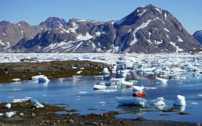 The Greenland icecap, which is up to 3 kilometres thick, is already melting and losing mass.