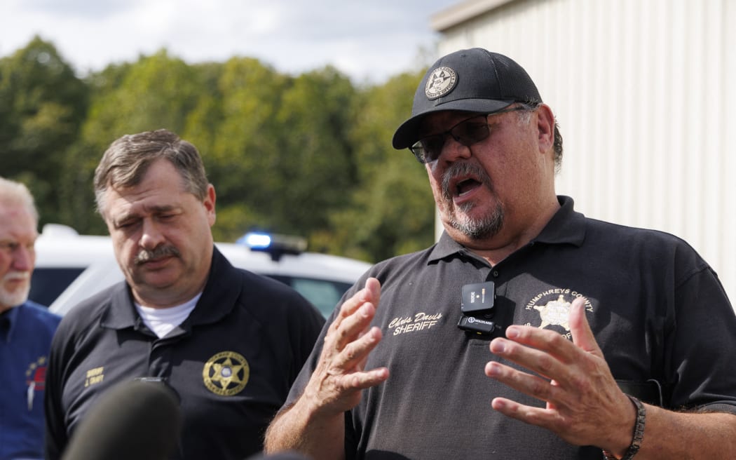 MCEWEN, TENNESSEE - OCTOBER 10: Humphreys County Sheriff Chris Davis speaks to media at Accurate Energetic Systems on October 10, 2025 in McEwen, Tennessee. An explosion this morning at Accurate Energetic Systems military munitions plant has left over a dozen people missing, with multiple fatalities reported.   Brett Carlsen/Getty Images/AFP (Photo by Brett Carlsen / GETTY IMAGES NORTH AMERICA / Getty Images via AFP)