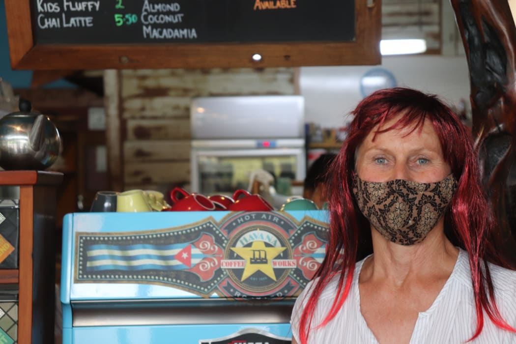 Eastend Cafe owner Angie Whitworth with her red wig.