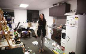 A Wellington apartment with a broken fish tank, smashed kitchen goods and a fridge that moved about a foot from the wall.
