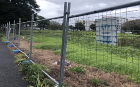 In Onehunga, Auckland, the site where a 186-apartment Kainga Ora development was planned now sits empty, after tenants of the previous building moved out and the new project was cancelled.