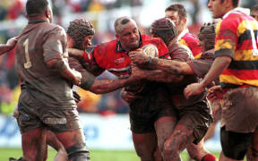 New Zealand Counties Manukau Rugby union player, Jonah Lomu getting tackled during a match, npc rugby 1999