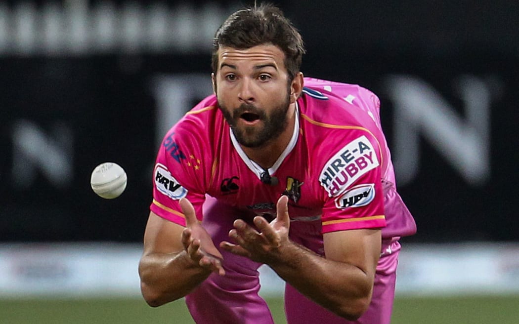 Anton Devcich takes a caught and bowled to dismiss Auckland Ace's captain Gareth Hopkins during the HRV Cup T20 cricket match.