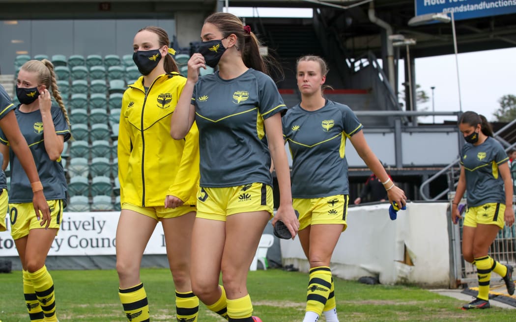 The Phoenix players walk out for warm-up at the A League Women's match.