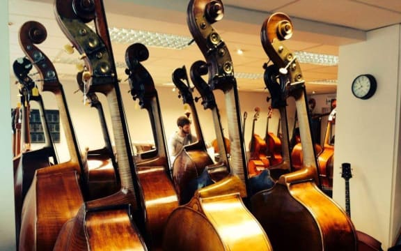 2016 Patricia Pratt Scholarship winner Alex Verster choosing a bass for his music school audition at Thwaites Fine Stringed Instruments in London