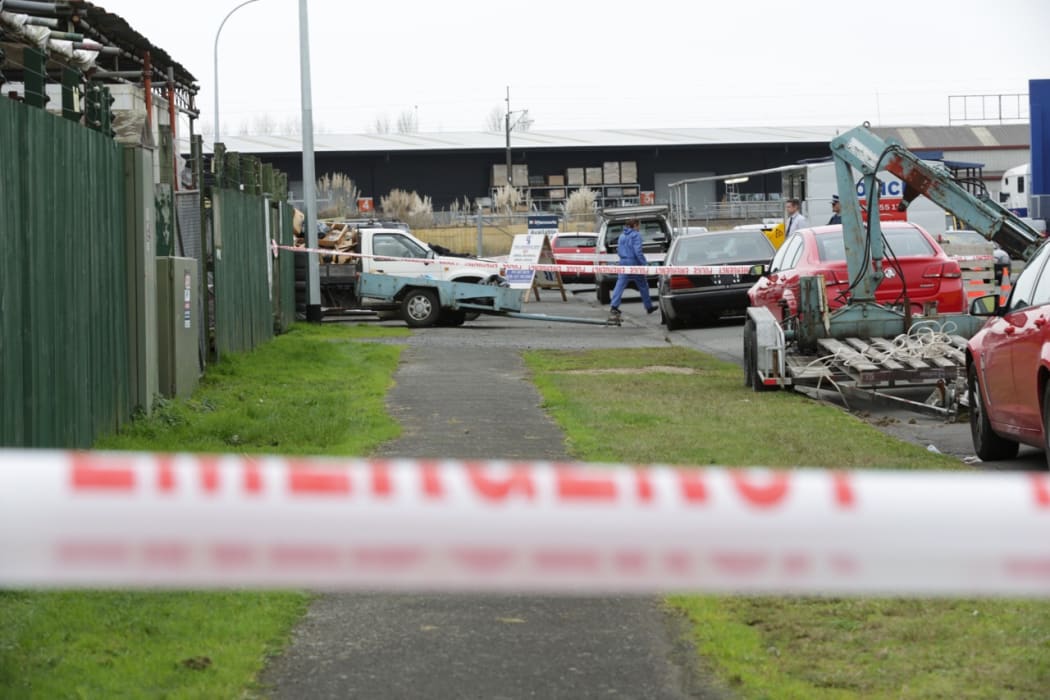 The area where a man was shot dead by police has been cordoned off.