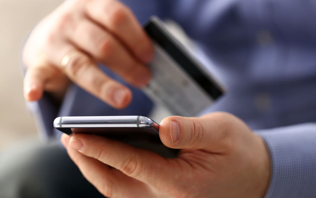 Online transaction using credit card and phone.
