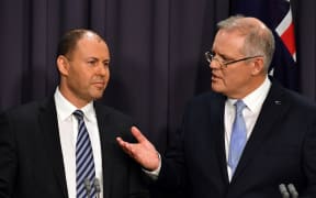 Australia's Prime Minister Scott Morrison (R) and treasurer Josh Frydenberg (L).