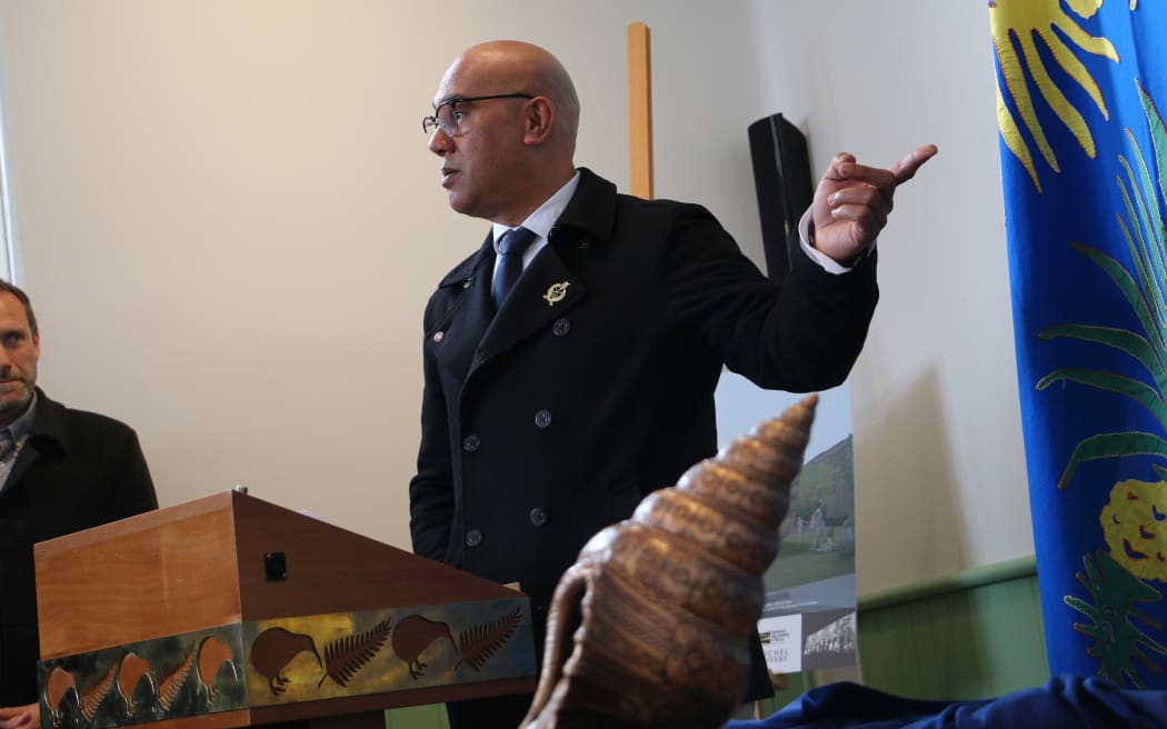 Artist Michael Tuffrey and a model of his design for the Pacific Islands memorial at Wellington's Pukeahu National War Memorial.