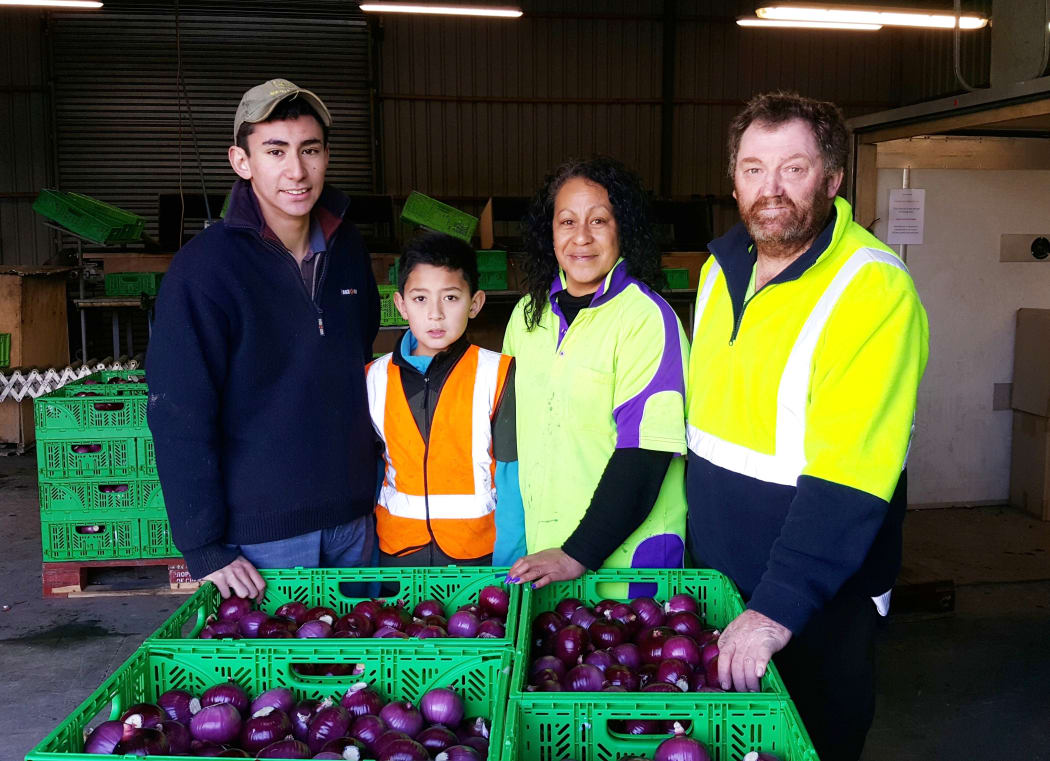 Lincoln, DJ, Makareta and Lance Roper in the packing shed