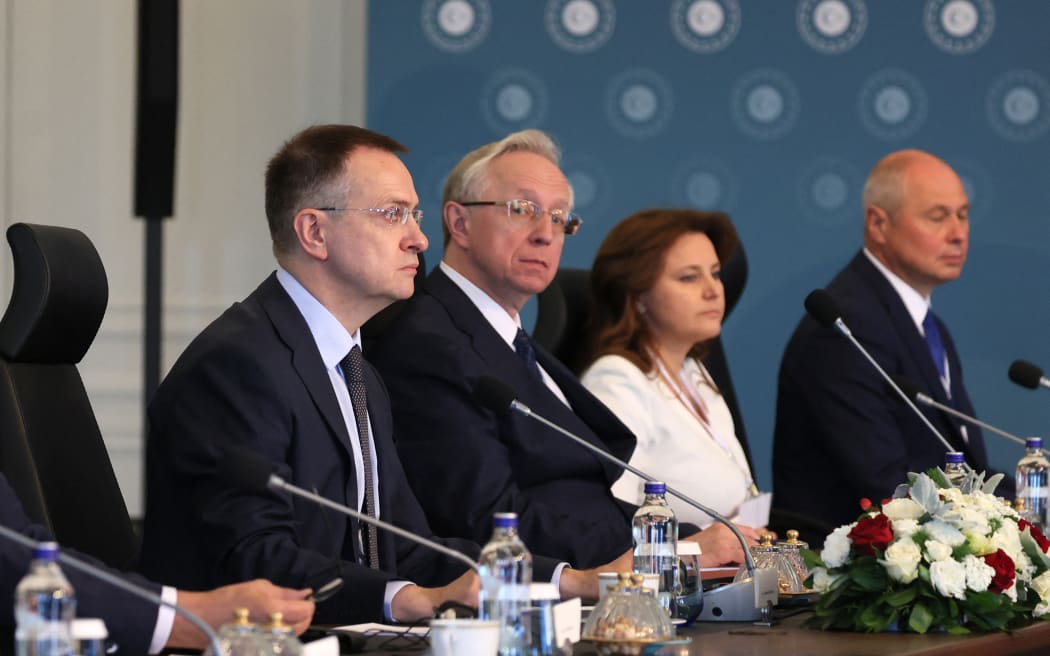 Head of the Russian delegation and Kremlin aide Vladimir Medinsky, left, sits with delegation members as they attend a second meeting of Ukrainian and Russian delegation direct talks, at the Ciragan Palace, in Istanbul, on 2 June 2025.