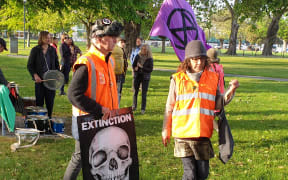 Extinction Rebellion activists stage a protest in Christchurch near the venue of the NZ Gas Forum.