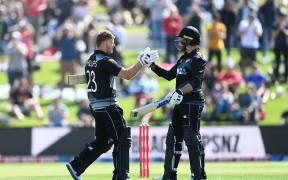 Glenn Phillips, left, and Devon Conway batting together for the Black Caps.
